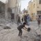 Palestinians remove rubble from a mosque which was hit in an Israeli air strike, in Jenin