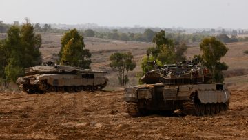 Israeli tanks take position near a border with Gaza