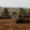Israeli tanks take position near a border with Gaza
