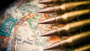 Map of the Middle East with Saudi Arabia in focus with bullets draped across