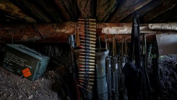Weapons of Ukrainian service members are seen in a trench at position at a front line in Donetsk region